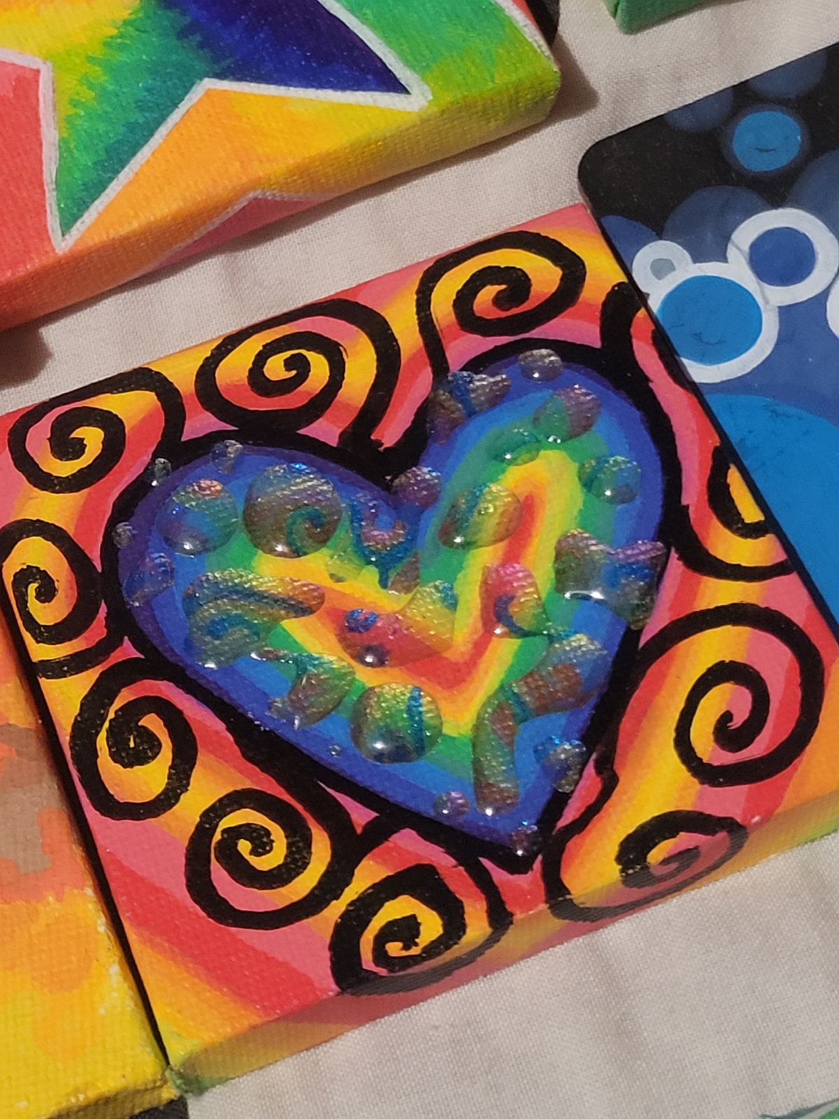 Many small rainbow pieces of artwork.