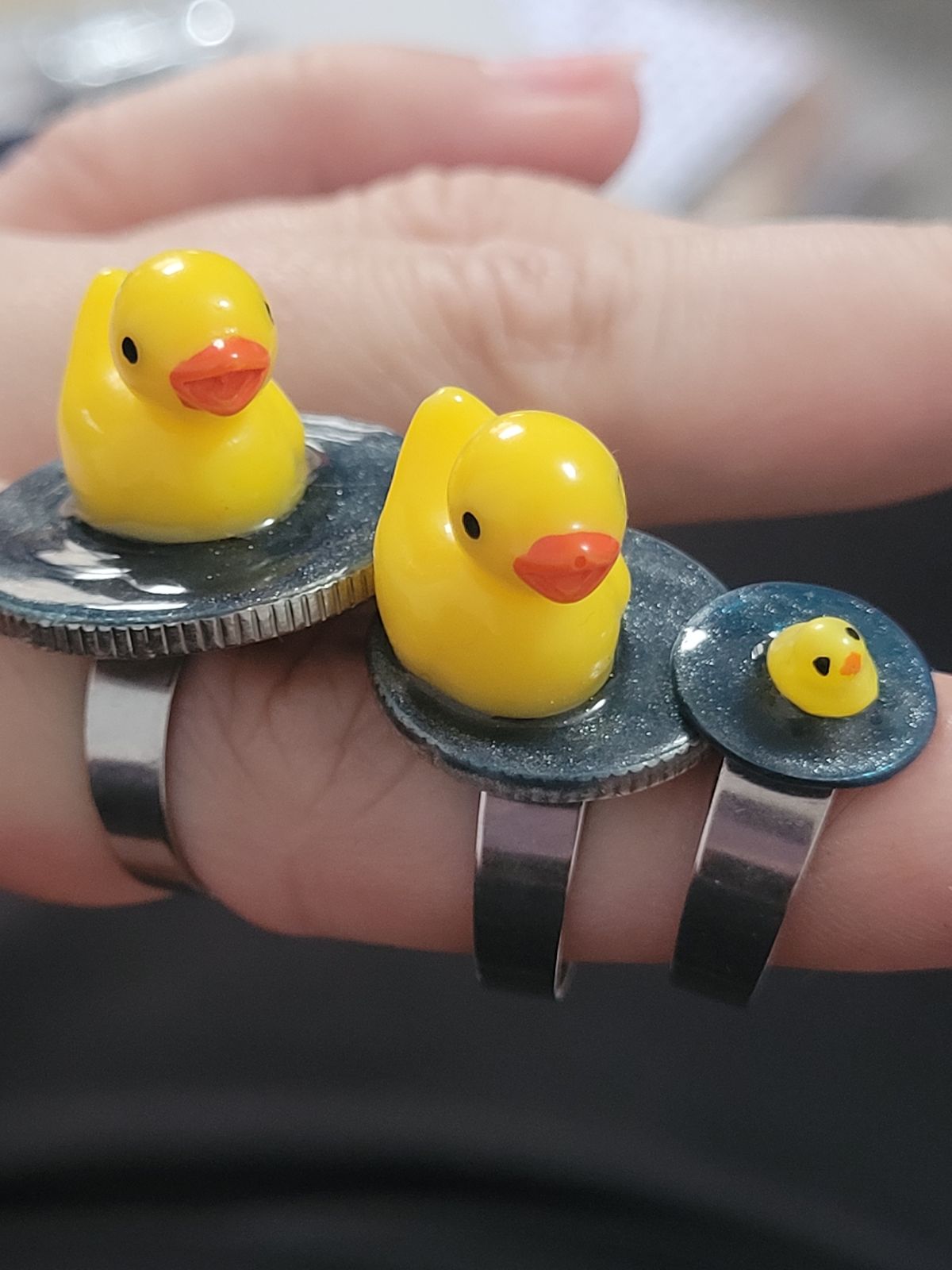 Three wearable duck pond rings, in decreasing sizes